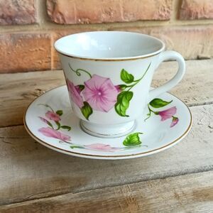 Teleflora morning glory teacup and saucer gold trim, footed